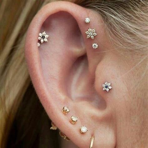 Triple Helix Piercing Is One Of The Most Liked Piercing By Ladies