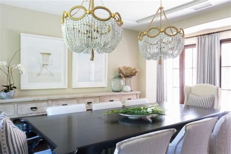 Neutral Coastal Dining Room With Double Chandeliers Hgtv