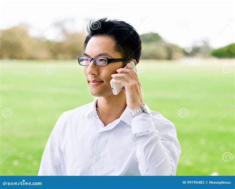 Businessman Portrait With Mobile Phone Outdoors Stock Photo Image Of