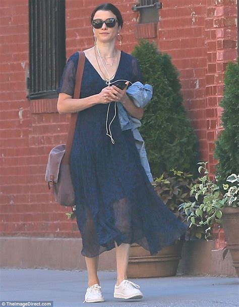 Rachel Weisz Looks Cool On A Hot Day In A Dark Blue Mini Dress With A