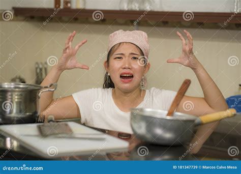 Young Frustrated Asian Woman In Domestic Chores Stress Lifestyle Home