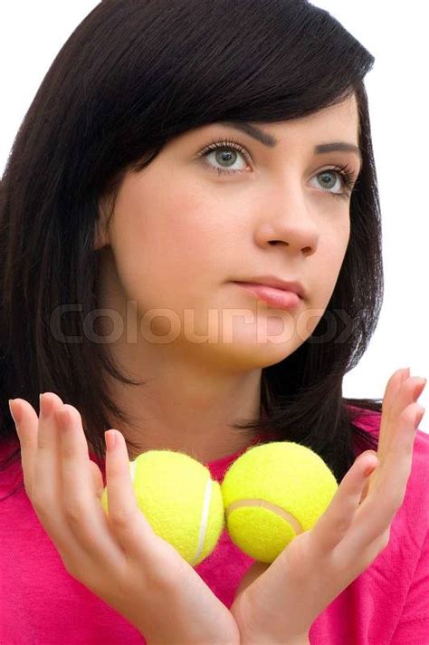 Girl Holding Two Tennis Balls On White Stock Photo Colourbox