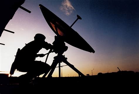 Soldier Operating Satellite Dish Ppm Systems