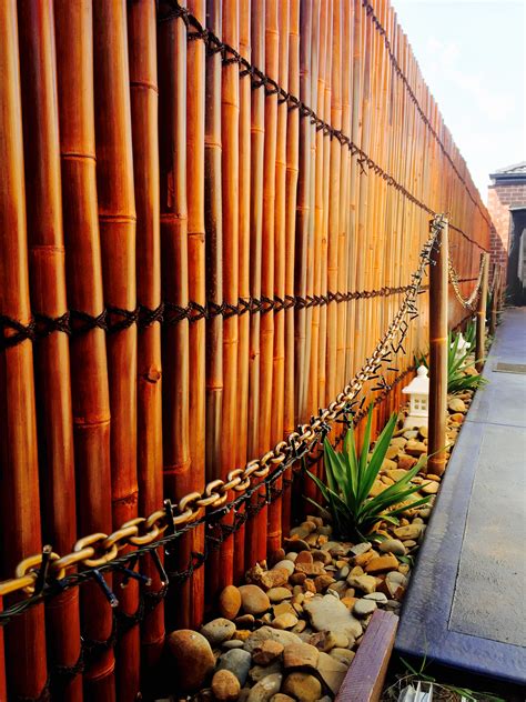 This is a beautiful, rustic example of a bamboo and reed fence. Bamboo fence panel for extra privacy | Bunnings Workshop ...