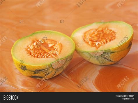 Orange Cut Melon Seeds Image And Photo Free Trial Bigstock