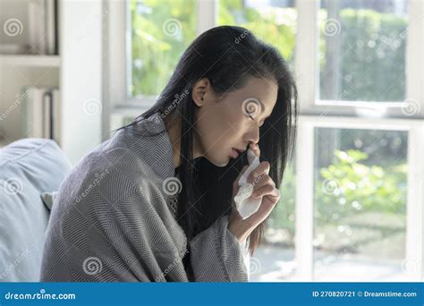 Ill Young Asian Woman Covered With Blanket Blowing Running Nose Got