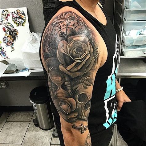 Clock tattoos for men exudes timeless symbolism and sentimental value. Skull And Clock Tattoo On Half Sleeve - CreativeFan