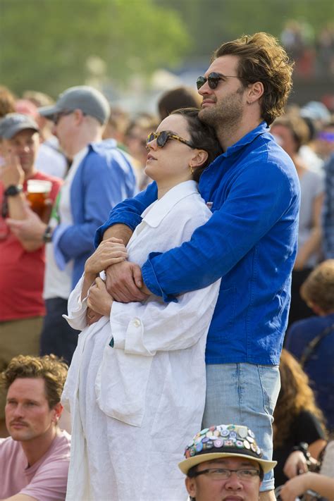 Star Wars actress Daisy Ridley cuddles fiancé Tom Bateman after confirming their engagement