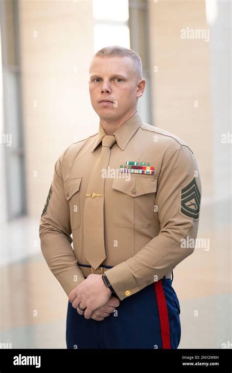 Us Marine Corps Gunnery Sgt Danny Risener Drill Instructor Of The Year Poses For A Photo