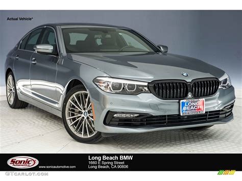 See what power, features, and amenities you'll get for the money. 2018 Bluestone Metallic BMW 5 Series 530e iPerfomance Sedan #125229000 Photo #4 | GTCarLot.com ...