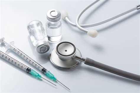 Medical equipment : stethoscope ampoules and syringe on white ba | Vegas Valley Vein Institute
