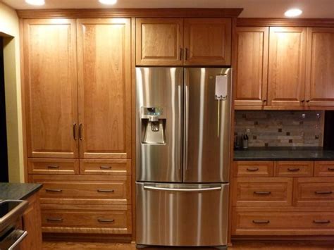 So you would basically see the wall, some door casing/trim, and the fridge would be right there with the front in the open. Pantry cab next to fridge -- 1.5" fillers by wall and on ...