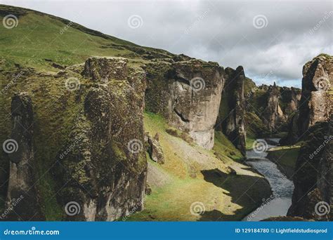 Scenic View Of Beautiful Mountain River Flowing Through Highlands In