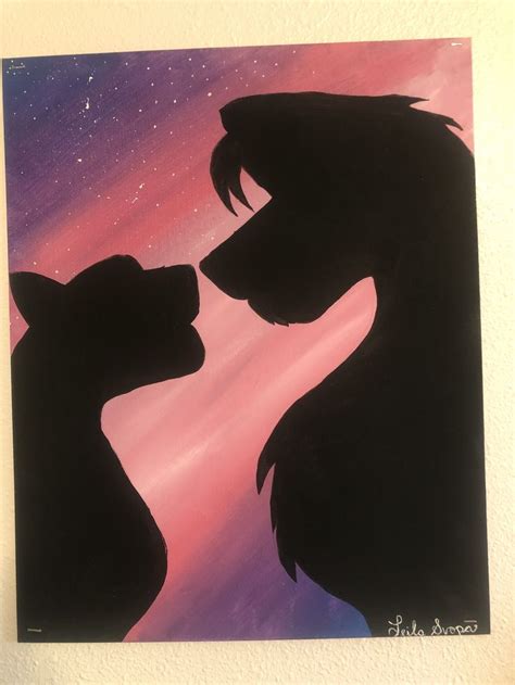 The Silhouettes Of Two Cats Face Each Other In Front Of A Night Sky