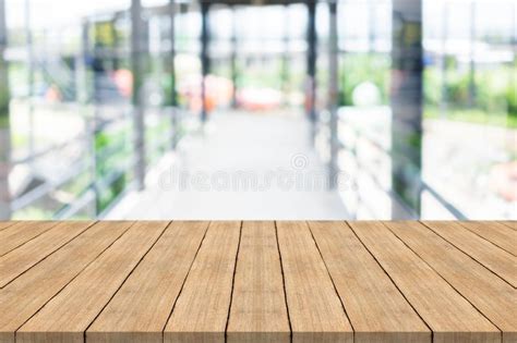 Empty Wood Table Top On Blur Background At Walkwayspace For Dis Stock