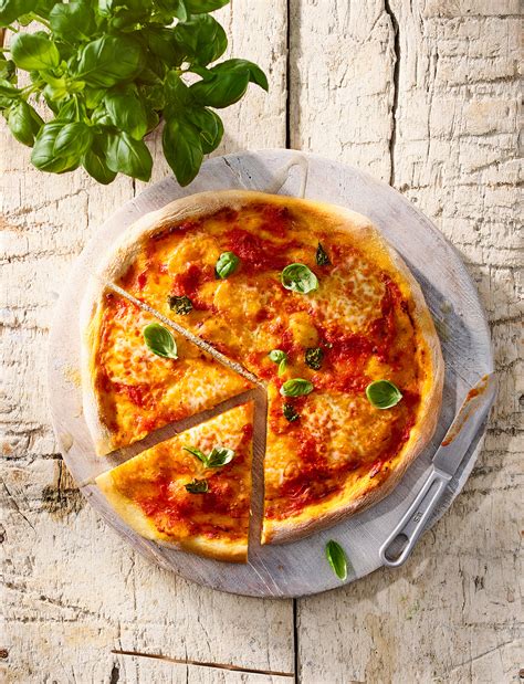 It's a super simple pizza with just a few ingredients but they work perfectly. Margherita pizza recipe | Sainsbury's Magazine