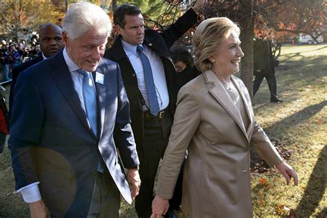 Bill Clinton Dazzled In A Revealing Blue Suit As He Cast His Vote For