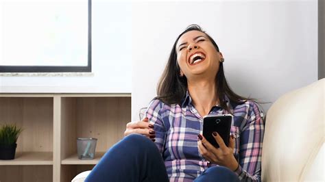 Slow Motion Of Woman Laughing With Phone In Stock Footage Sbv 320706755