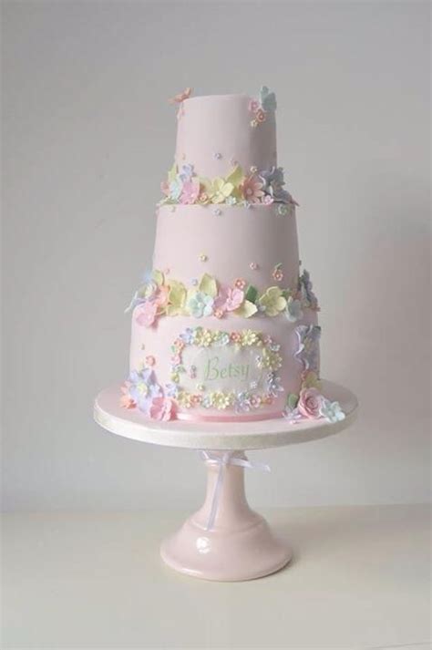 The floral 90 cake topper that matches the floral cake layer is a wonderful touch! very girly flower theme birthday cake | Wildflower cake ...