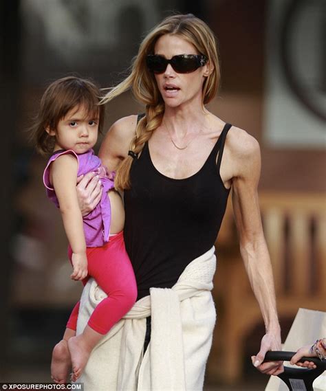 Denise Richards Displays Bony Veiny Arms While Getting Ice Cream With