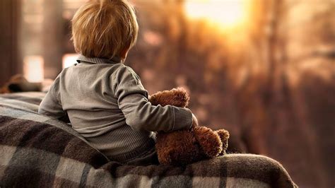 Backside Of Cute Baby Boy Is Sitting With Toy Hd Cute Wallpapers Hd