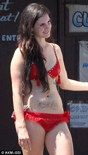 Lana del rey, lizzy grant, may jailer, elizabeth grant, sparkle jump rope queen) was born in lake placid, new york city, new york, united states. Lana Del Rey reveals large faux belly tattoo as she slips ...