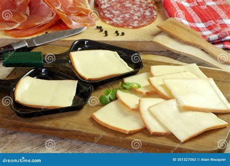 Raclette Cheese Slices And Cold Cuts Stock Photo Image Of