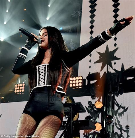 Selena Gomez Wears Hotpants And Fishnet Stockings For Jingle Ball