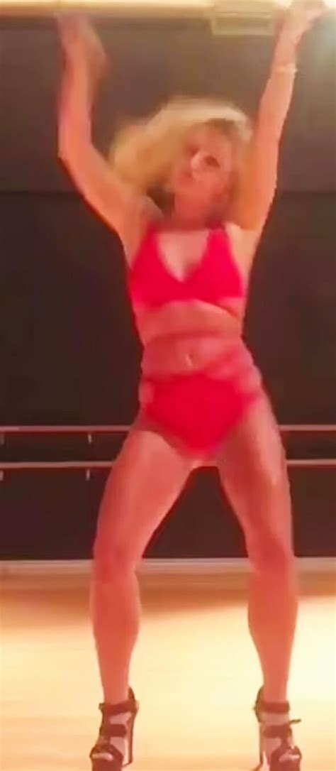 britney spears strips down to skimpy red bikini as she flashes flesh unveiling dance moves big