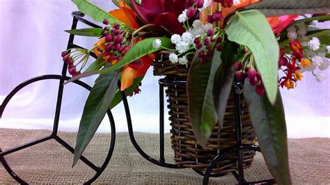 I'm showing you how to put together a fun, floral table runner using all beautiful and bright colors, just in time for the. tabletop bicycle centerpiece with cymbid orchids, garden ...