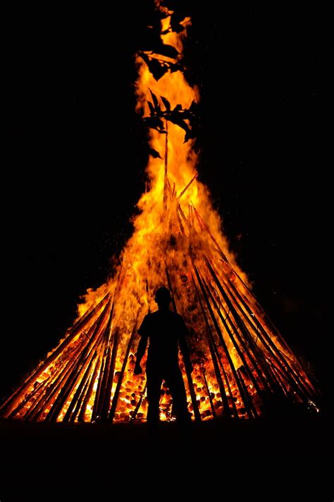 This photo is about standing, vertical, wildfire. Royalty-Free photo: Silhouette photo of man on fire | PickPik