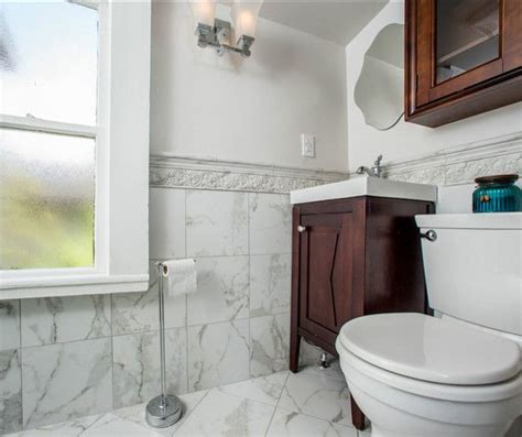 A white marble bathroom always looks exceptional. Bathroom Design. Great finishins in this small bathroom. I ...