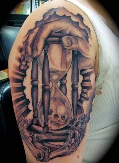 Black And Grey Skull In Hourglass Tattoo On Half Sleeve Hourglass