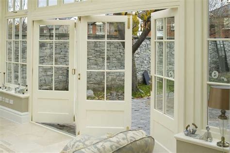 love the idea of having this wall of bi-fold doors that ...