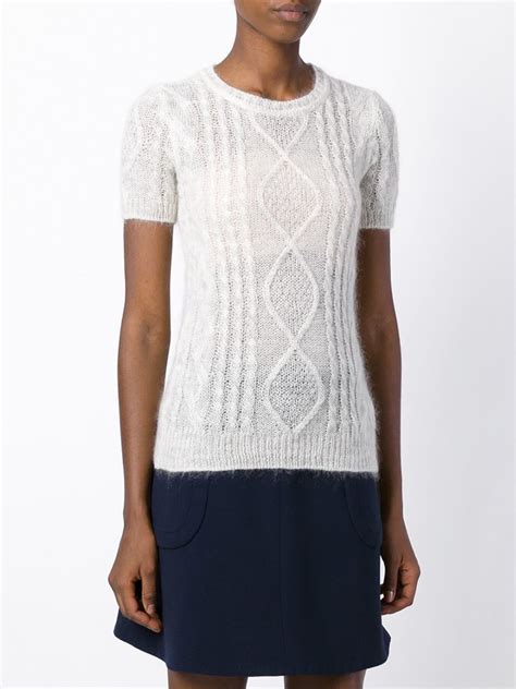 A perfect cardigan to complement tank tops or strapless dresses, this short sleeved raglan sweater is simple to knit and makes an excellent layering piece. Ermanno scervino Short Sleeve Cable Knit Sweater in Beige ...