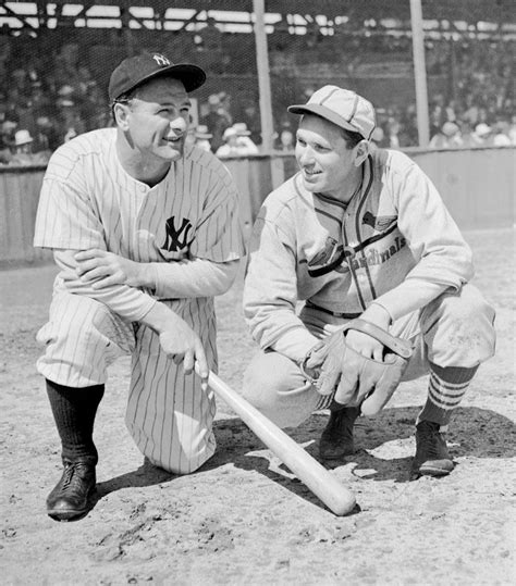 lou gehrig and cardinals pitcher dizzy dean talk together before a game lou gehrig cardinals