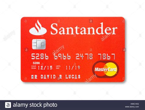 Contact number for santander credit card. Simple cut out of a Santander credit card with holding shadow Stock Photo - Alamy