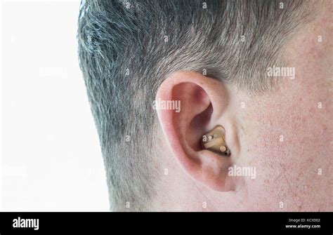 Man Wearing Hearing Aid Hi Res Stock Photography And Images Alamy