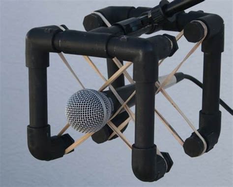 The collective wisdom of the internet will simply tell you to duct tape your mic to a broom and lean it up. 25 DIY Mic Stand Ideas - How To Make A Microphone Stand