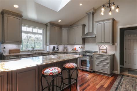 When faced with a kitchen remodeling project, don't replace, refinish. Whole house painting - Cabinet Refinishing - Traditional - Kitchen - St Louis - by Kathy Arnold ...