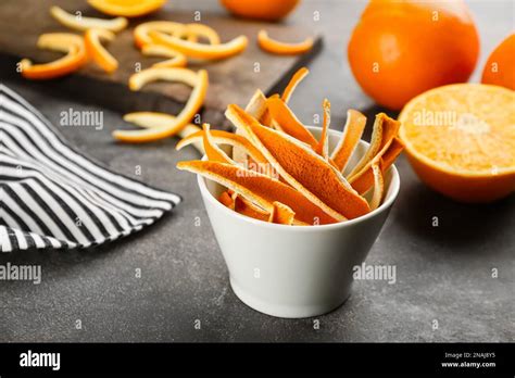 Dry Orange Fruit Peels On Grey Table Stock Photo Alamy