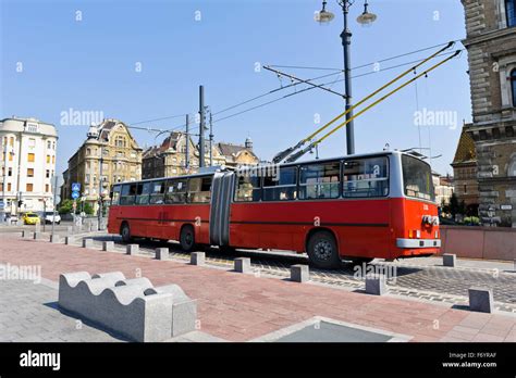 An Electric Red Bus Public Transport In Budapest Hungary Stock Photo