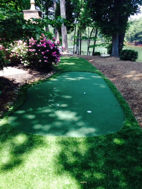 Leveling is a simple process, but the mixing is an obstacle. Do It Yourself Putting Greens | Custom Putting Greens