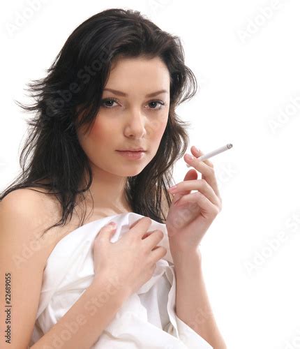 Portrait Of A Young And Sexy Brunette Smoking A Cigarette Buy This