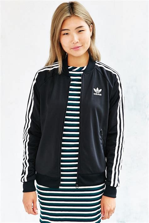 From casual track jackets to high performance outwear. adidas Superstar Track Jacket in Black - Lyst