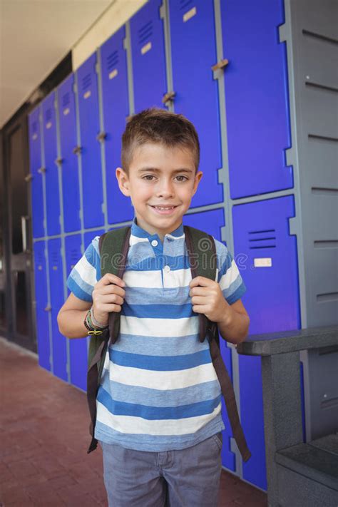 Portrait Of Smiling Boy Standing In Corridor Stock Image Image Of