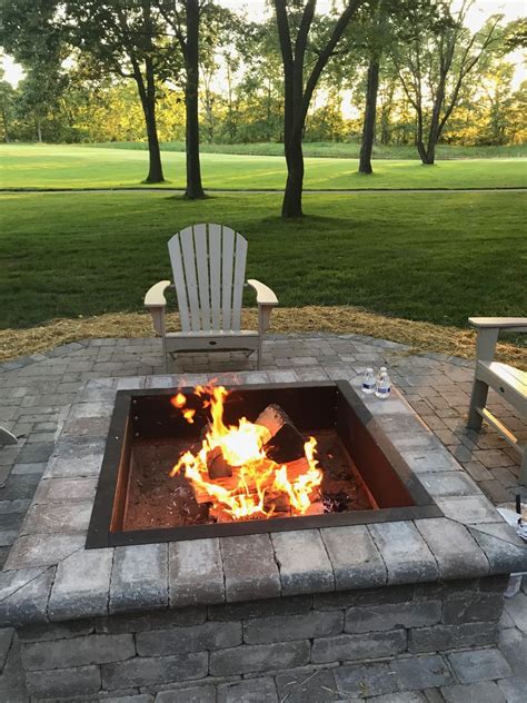 The best way to have a fire pit in a brick patio is to dig out the patio bricks underneath the pit. Unilock Brick Paver Fire Pit #Brick #Fire #Paver #Pit in ...