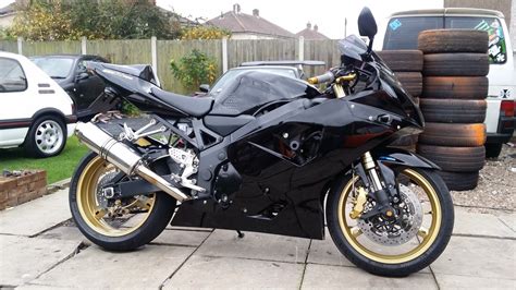 I passed my cbt in may. 2004 SUZUKI GSXR 750 BLACK AND GOLD CUSTOM BODYWORK GSXR750