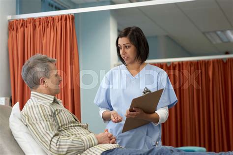 Nurse Talking To Patient Stock Image Colourbox