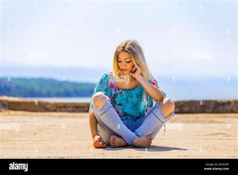 Barefoot Woman Sitting Legs Crossed